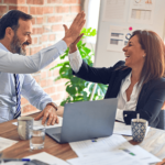 Two people high-fiving