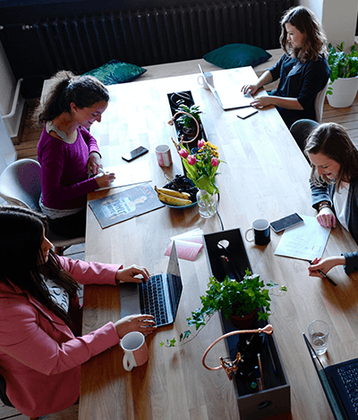 An overhead photo of a group working together at a table