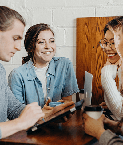 Three people conversing together