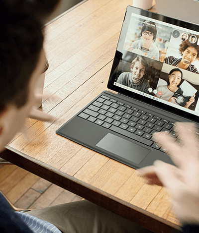 A virtual meeting on a laptop screen